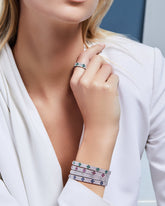 Love In Verona Diamond & Sapphire Bangle - Dracakis Jewellers